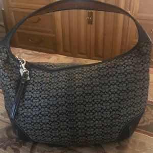 Black and white coach hobo bag with detachable key ring